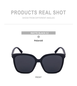 Front view of matte black oversized butterfly polarized sunglasses with dark grey lenses