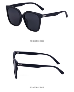 Detail view of black oversized polarized sunglasses showing 45 and 90 degree side angles