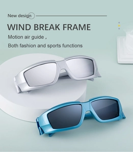 Detail of silver and blue windproof sports sunglasses with metal coating lenses