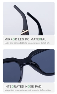 Détail de lunettes œil de chat noires avec accents dorés et plaquettes de nez intégrées