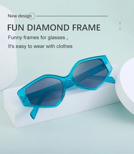 Modern diamond-shaped geometric sunglasses with teal frames and dark lenses