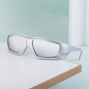 Silver Y2K windproof sports sunglasses with futuristic wrap around shield frames