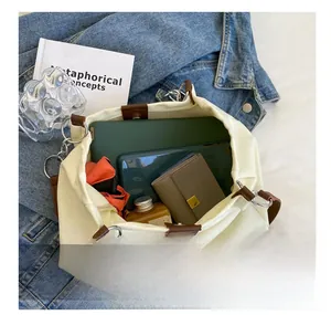 Top view of cream canvas tote bag interior showing spacious capacity for daily essentials