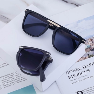Retro folding square frame sunglasses with UV protection in black finish and dark lenses