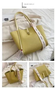 Détails du sac seau en cuir jaune avec une large bandoulière mode et des boucles dorées