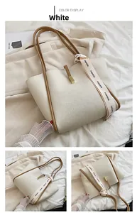 Détail d'un sac cabas en cuir crème avec des poignées marron et un foulard de mode