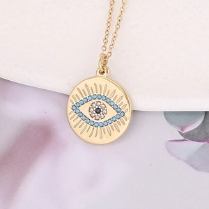 Collier pendentif Mauvais Œil doré avec perles bleues et cristaux pour femme