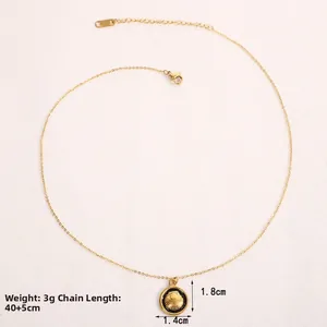 Detailed view of shell pendant necklace showing 40+5cm chain length and 1.8cm size