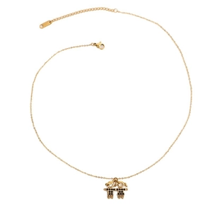 Collier en acier doré avec pendentifs couple garçon et fille sertis de cristaux noirs