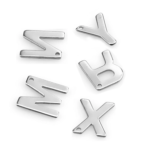 Macro detail of stainless steel DIY initial charms Z Y R M X for custom necklace making