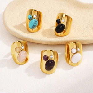 Wide vintage gold stainless steel ring with oval natural stone and tiny zircon accent