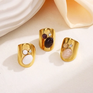 Set of three vintage wide gold rings with colorful oval natural stones and small diamonds