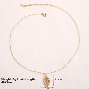 Detail of leaf pendant necklace with dimensions 2.5x1cm and 40+5cm chain length