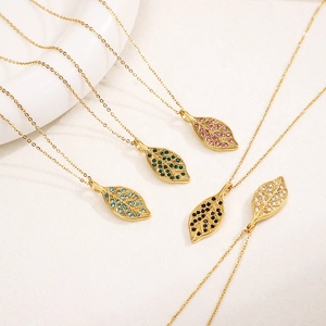 Golden leaf necklaces with colorful crystals in pink green blue black and white variants