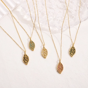 Golden leaf necklaces set with sparkling crystals and fine chain for elegant women
