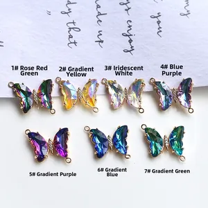 Detailed view of colorful crystal butterfly charms with micro-pave cubic zirconia and dual loops