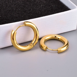 Polished gold titanium steel hoop earrings for women in a minimalist round clicker style