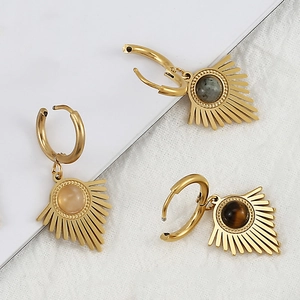 Detail of sunburst hoop earrings with natural tiger eye and labradorite stones