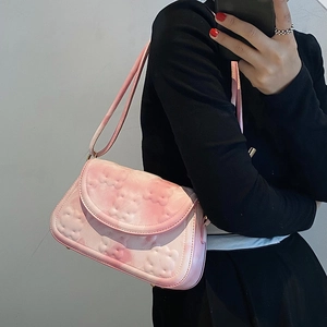 Pink faux leather shoulder bag with floral embossing and slim strap for summer fashion
