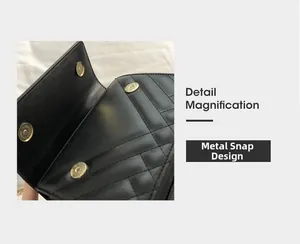 Detail magnification of high-quality magnetic closure on black quilted leather handbag