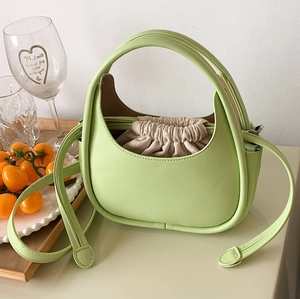 Sac bandoulière demi-lune vert clair chic avec insert en toile pour femmes