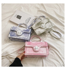 Chic women's crossbody bags with marble texture and floral metal buckle detail