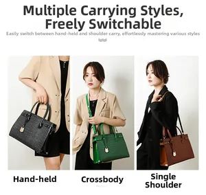 Crocodile pattern handbags shown in black green and brown with shoulder straps
