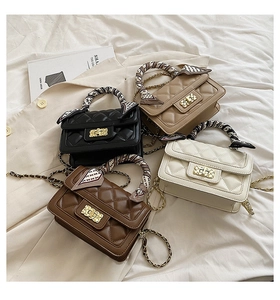 Detailed view of quilted square crossbody bags in black, tan, white, and khaki with scarves