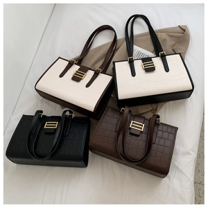 Collection of crocodile pattern tote bags in black, brown and bicolor faux leather