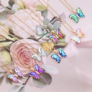 Gradient crystal butterfly pendant necklaces in various colors with a delicate gold chain