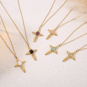 Vintage gold cross pendant necklaces with colorful gemstones and textured metal finish