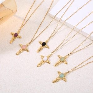 Set of six colorful cross necklaces with gold chains and vintage textured stone pendants
