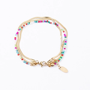 Detail of multi-layer beaded bracelet with gold snake chain and lobster clasp