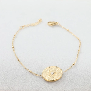 Bracelet en acier inoxydable plaqué or 18K avec pendentif soleil et zircon cubique