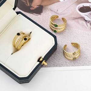 Three-layer gold-plated stainless steel rings with natural stones and twisted texture