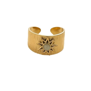 Wide gold flower ring in titanium steel with green stone and starburst texture