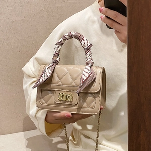 Milk tea quilted crossbody bag with diamond pattern, silk scarf handle, and gold chain