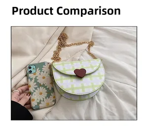 Size comparison of a plaid saddle bag next to a smartphone showing compact interior capacity
