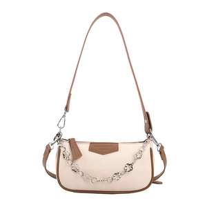 Sac à bandoulière crème minimaliste avec bordure brune et chaîne fleurie argentée