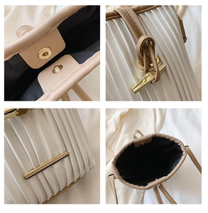 Detail shots of pleated PU leather bag showing magnetic closure and interior lining