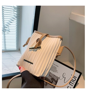 Chic pleated bucket bag in creamy white PU leather with khaki trim for daily casual wear