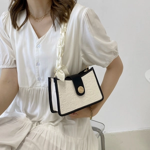 Retro white PU leather shoulder bag with cartoon embossing and silk scarf handle