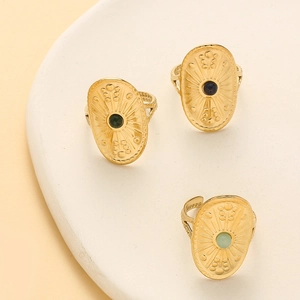 Vintage gold shield ring with sunburst pattern and colorful natural stones for women