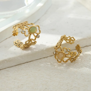 Luxurious gold flower rings with green and yellow gemstones and fine zircon accents