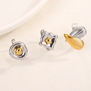 Three-piece retro mixed metal jewelry set with geometric shapes and bicolor gold plating
