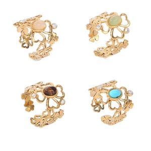 Bohemian gold-plated floral rings set with cat-eye stones and pavé zircon accents