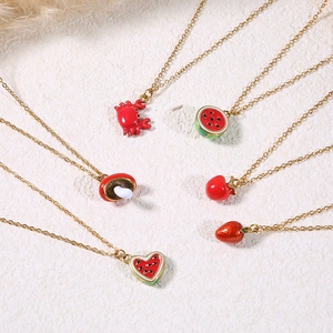 Minimalist stainless steel necklaces with red enamel fruit and animal pendants on gold chains