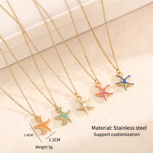 Detail view of colorful enamel starfish pendants in gold-plated stainless steel chain
