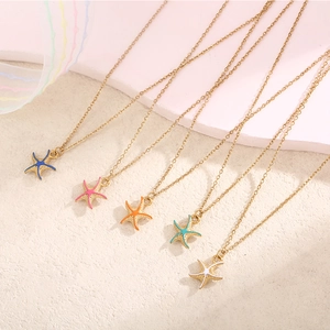 Summer ocean style starfish enamel pendants on gold necklaces in five vibrant colors