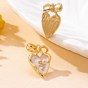 French vintage gold heart earrings with pink enamel and delicate rose relief detail